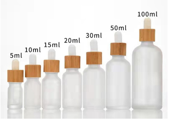 Le compte-gouttes cosmétique de luxe de JiaZi met l'huile en bouteille de parfum de 5ml 10ml avec le chapeau en bambou